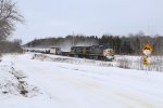 Kicking up a small amount of snow, a matching pair of YN2 AC4400's take Q327 west